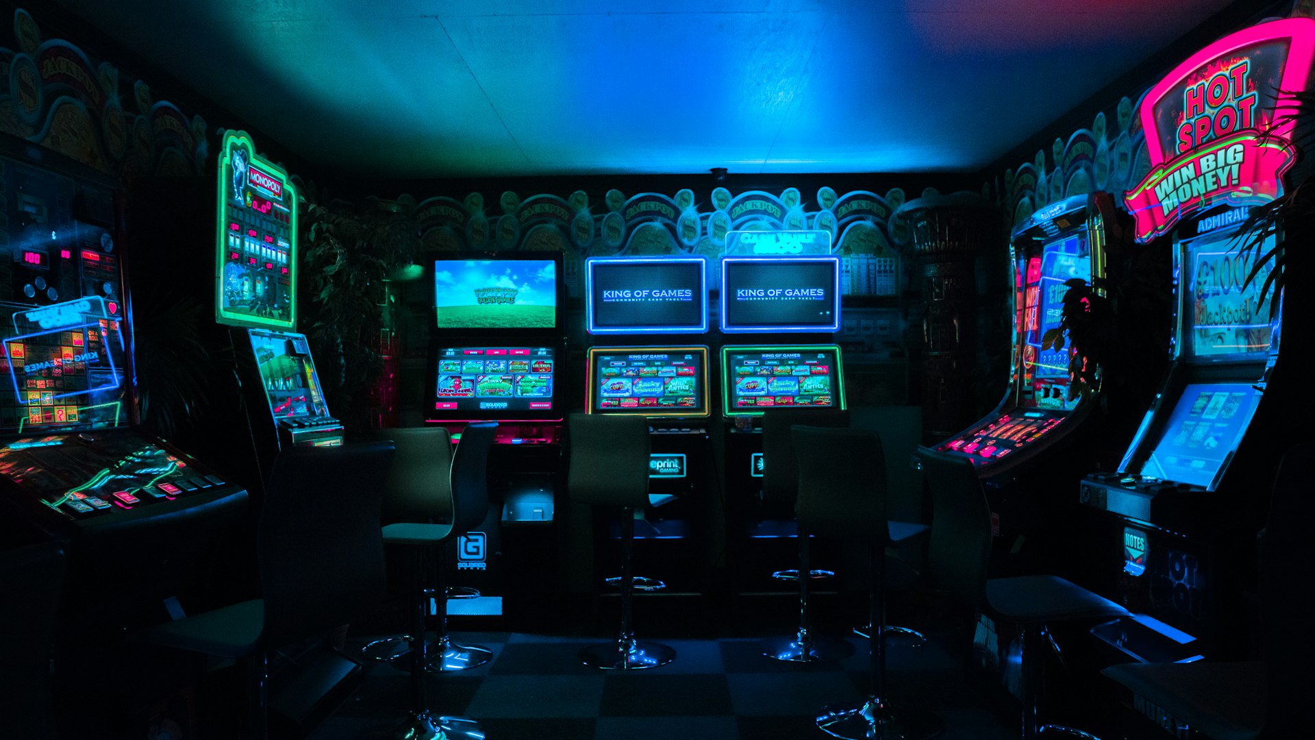 The neon-lit main gaming floor at DragonProtocolHub in Redfern